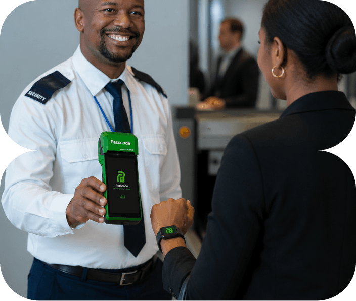 A security officer checking a resident in at the gate with a Passcode terminal